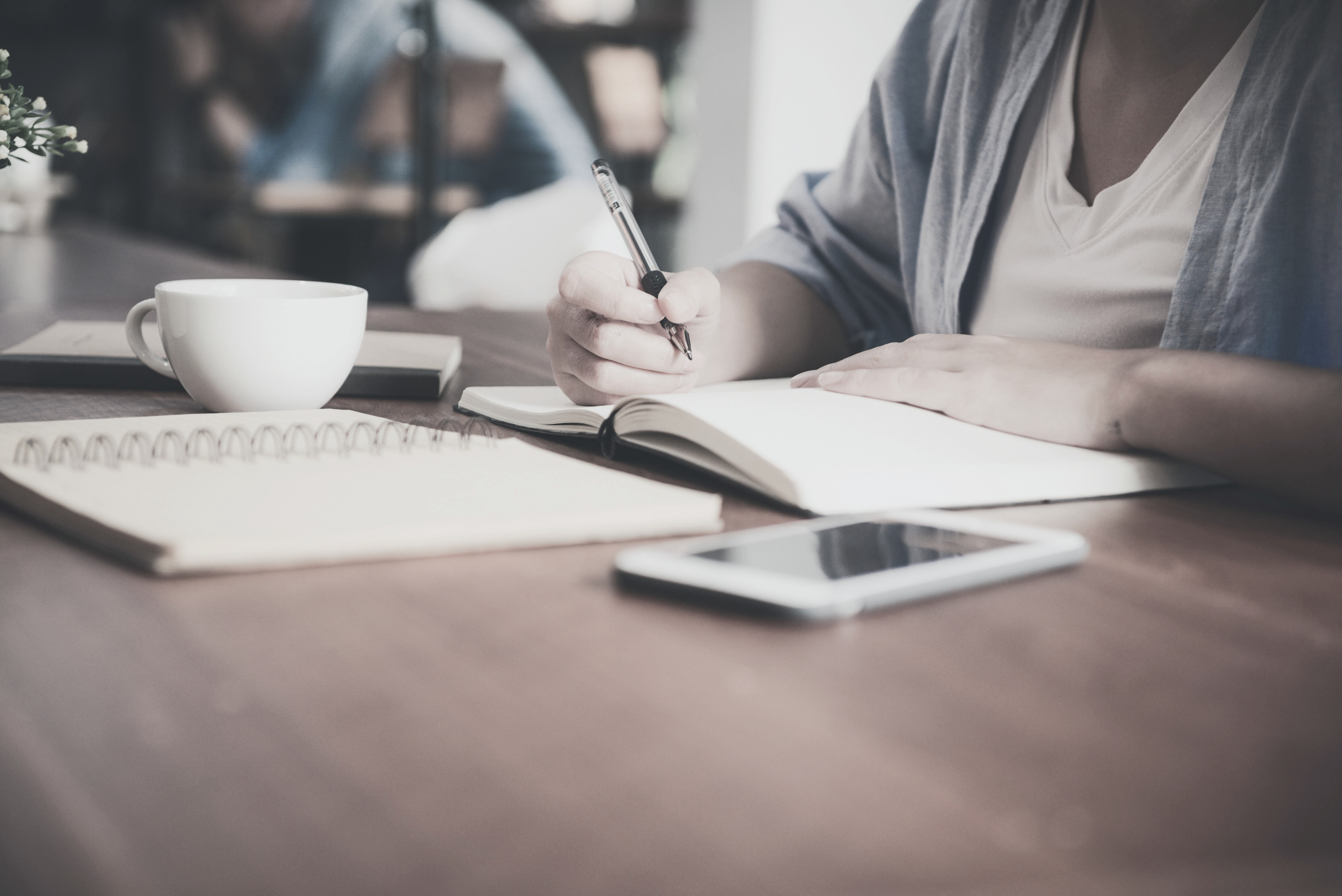 Notes and a notebook on a working table